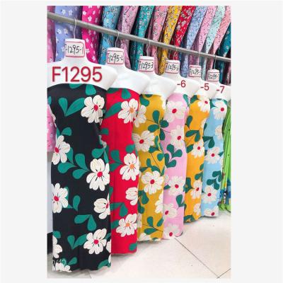 China Anti Pill Wholesaler 40s 100gsm Flower Printing Viscose Fabric Supplier Rayon Poplin Fabric For Man And Woman for sale