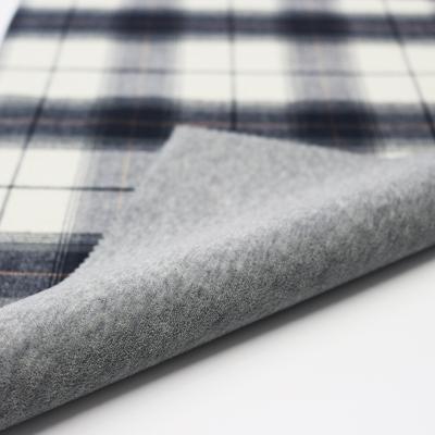 China Waterproof Memory Spandex Checks Print Bonded Flannel Polyester Fabric For Outdoor Jacket for sale