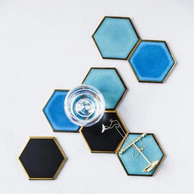 China Sustainable Luxury Gold Plated Ceramic Coasters Porcelain Geometric Mug Matte Waterproof Heat-Insulated Pad Table Decoration for sale