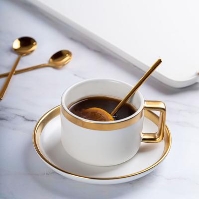 China Viable High Quality Matte White Ceramic Porcelain Coffee Tea Cups and Saucers Sets Gold Handle Coffee Cup for sale