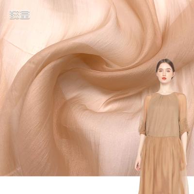 China Sheer Silk Shimmer Satin Making Dress Wedding Brocade Luxury Argento Crystal Bright Tissue 100% Polyester Wholesale Organza Fabric for sale