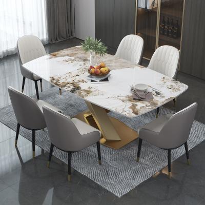 China Luxurious Extendable Stainless Steel Design Marble Dining Table Dining Room Furniture Table Dining Table Set for sale