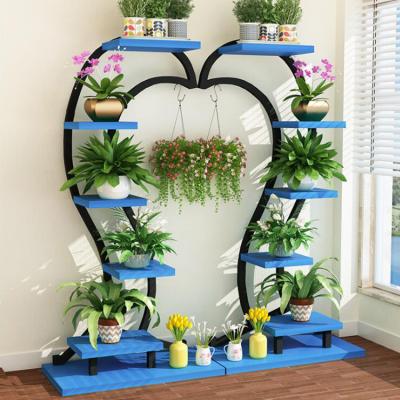 China Modern Multi-Layer Floor Type Wrought Iron Wheel Floor Stand Indoor Plant Flower Rack Flower Pot Shelf Flower Pot Rack for sale