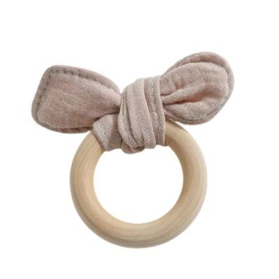 China Relief Baby Teething Wooden Training Sensory Aid Ring Teething Toys Handmade Baby Ring Bunny Ears Teether With Fabric Wooden Pain Baby Teether for sale