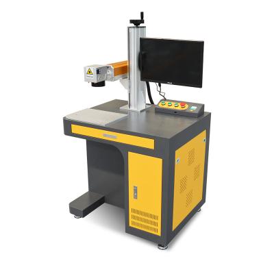 China 20w/30w/50w/70w/100w self loading white/black/color fiber laser /fiber laser price marking machine engraver for sale