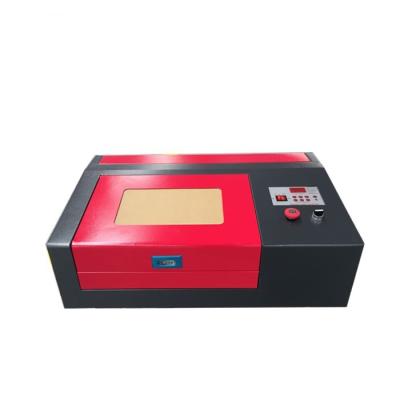 China Laser CUTTING WR-3020 CNC Laser Cutting Machine Stamp Laser Engraver Factory 40w for sale