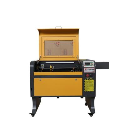 China New 6040 high quality 80w 100w 3d photo co2 laser marking machine water cooled engraving machine for wine bottle denim bamboo for sale