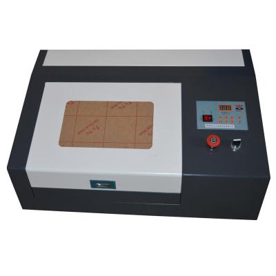 China Laser CUTTING WR3020 40W CO2 Laser Engraving Machine M2 Control for sale