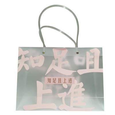 China Waterproof PP Tote Bag Customized Printing Plastic Shopping Bag Frosted Transparent Fashionable Pipe Rope Rose Portable Printing Font for sale