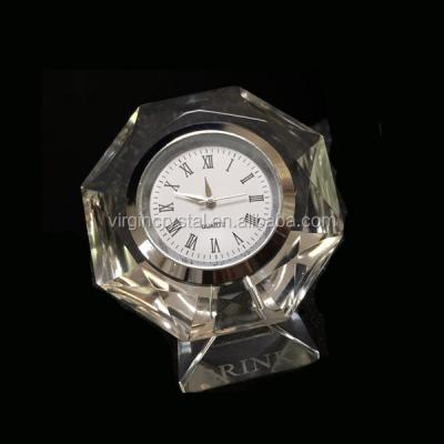 China Crystal Optical Small Octagon Shape Crystal Table Clock with Engrave Brand Logo for Business Gifts for sale