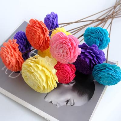 China Elegant paper artificial sucks flowers sola paper rsrice handmade flower wedding home decoration for sale