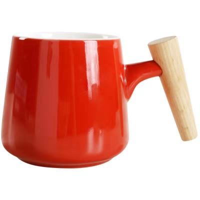 China Viable Selectable Ceramic Coffee Mugs Color Porcelain Mugs With Wooden Handle for sale