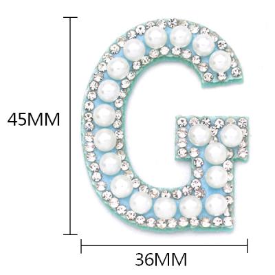 China hot sale 3d hotfix rhinestone applique letter logo stick on pearl letter badges for sale