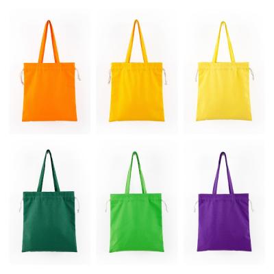 China 100% Eco-friendly Cotton Bolsas De Lona Compras Promocional Regalo Hot Sale Gift Bags For Beach With Drawstring Closure for sale