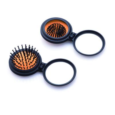 China Collapsible Hair Brush Plastic Round Comb Collapsible Hair Brush With Mirror for sale