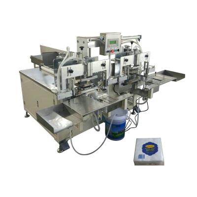 China Tissue Paper Napkin Double Head Tissue Paper Packing Machine for sale