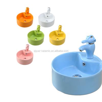 China Ceramic Colored Porcelain Glazed Baby Bathroom Ware Sanitary Ware Basin For Kids With Faucet Hole for sale