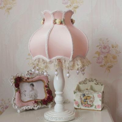 China Modern Designer Romance Home Etching Or Hotel Flower Shape Decorative Pink Fabric Shade Table Lamp for sale