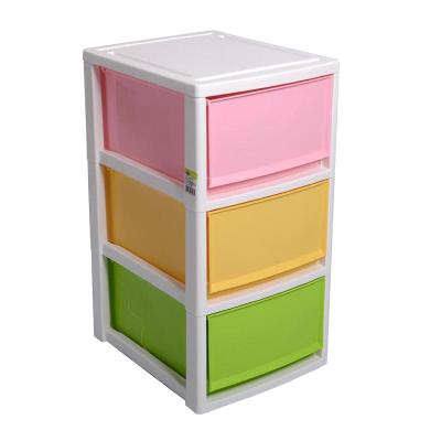 China Japanese and Korean Stocked Candy Color Combined Drawer Dressing Toy Portable Children's Clothing Storage Cabinet for sale