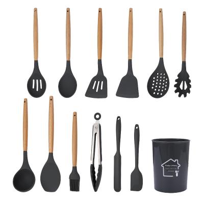 China Amazon Hot Selling Spatula Set Silicone Cookware Stainless Steel Tools Viable Kitchen Tableware With Wooden Handle for sale