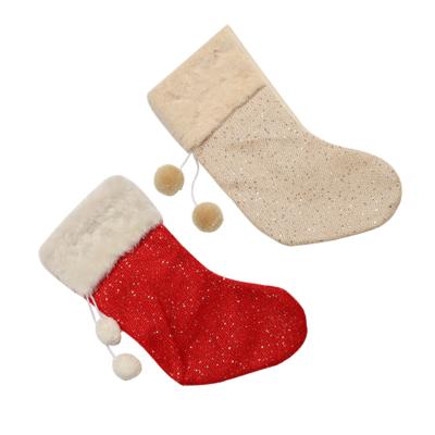 China Merry Christmas decoration factory supplier Christmas party decoration stocking jars handmade knitted sequin candy storage bag for sale