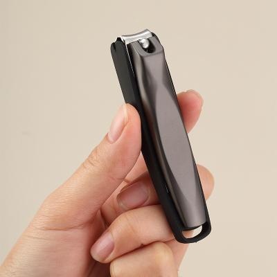 China Beauty care makeup factory cheap carbon steel black portable small finger nail clipper for sale