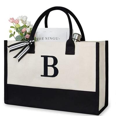 China Portable Personalized Gift Letter Pattern Large Waxed Canvas Bag Embroidered Tote Bag Shoulder Women Handbag for sale