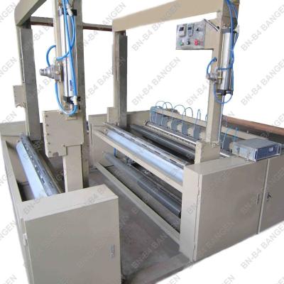 China Automatic Easy Operation Gauze Bandage Rewind Rolling Cutting Machine for sale