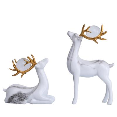 China Hot Selling Europe Handcrafted Polyresin Wilderness Deer Figurine, High Quality Resin Wilderness Elk Animal Ornaments for sale