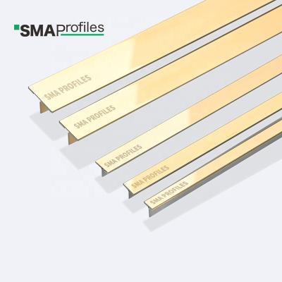 China Modern SMA Tile Accessories Metal Inlay Strips T Profile Stainless Steel Tile Trim For Wall for sale