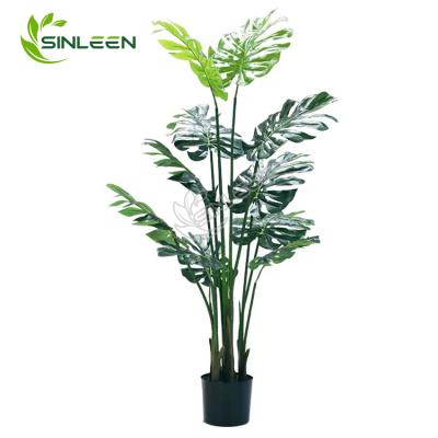 China Art Decor Higher Cost Performance Fabric Leaf Plant Artificial Monstera Variegata for sale