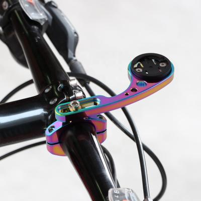 China Compatible with a Variety of Computer Bases Bicycle Handlebar Extended Bracket Rainbow Color Bike Computer Mount Holder Odometer GPS Mount for sale