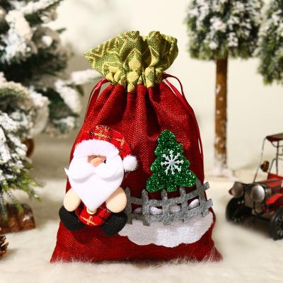 China Cute Older Festival Decoration Fun Fashion Snowman Fence Drawstring Tote Bag Candy Gift Drawstring Pocket Christmas Gift Bag for sale