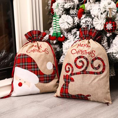 China Cute Tote Bag Christmas Drawstring Pocket Festival Decoration Candy Bag Wholesale Canvas Christmas Gift Bag for sale