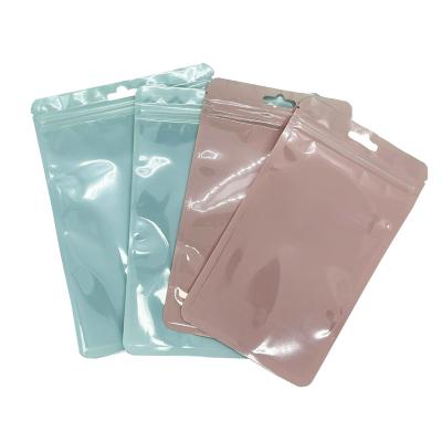 China Custom Transparent Resealable Food Packaging Plastic Bag Holographic Colorful Zipper Moisture Proof for sale