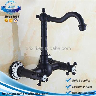 China Wall Mounted Metered Faucets Swivel Spout Bathroom Faucet With Cross Handles With Black Ceramic Back Plates, Oil Rubbed Bronze 3269B for sale