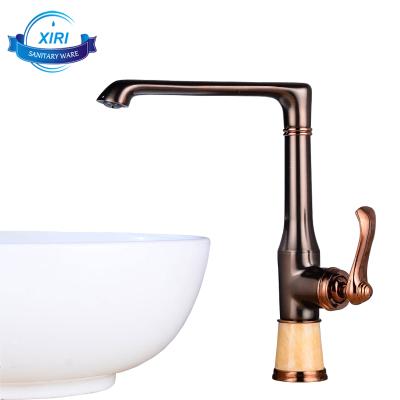 China Traditional Deck Mounted New Design GLOBE XiRi-8747 Brass Marble Hot And Cold Water Faucets For Kitchen for sale