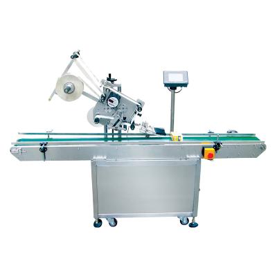 China Beverage shang hai Taoshan JT 210 automatic top label applicator for flat surfaces for sale