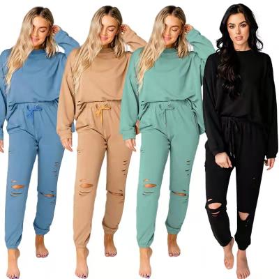 China 2021 QUICK DRY Winter Clothes Women Wholesale Custom Logo Crop Top Sweatshirt Suit Women Tracksuit Custom Women's Joggers 2 Piece Set for sale