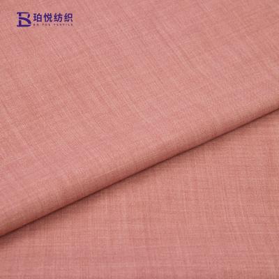 China wool coat fabric100%wool/WP7030/WP5050/WP6040worsted  fabric wool polyester fabric in stock   for suit  Coat overcoat outfit en venta