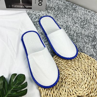 China Nap Fabric Customized Logo OEM Closed Toe EVA Sole Disposable Guest Nap Fabric Hotel Amenities Slippers for sale