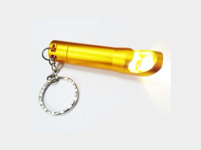 China Promotional Personalized Anodized Gold Blank Laser Etch Aluminum Keychain  Beer Bottle Opener with Mini LED Flashlight for sale