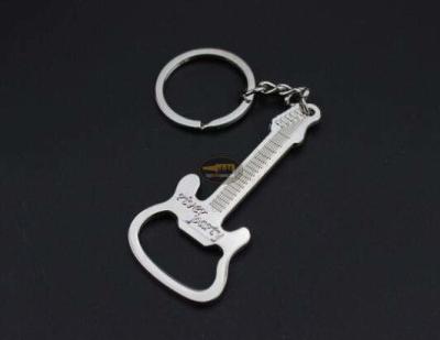 China Cool Innovative Promotion Gift Wedding Favor Blank Laser Engrave Logo Guitar Shape Bottle Opener Keychain for sale