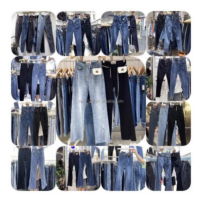 China Color Fade Proof 2023 new hot style pants women's jeans stretch high waist jeans with holes jeans women for sale