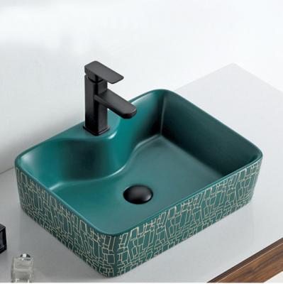 China Matt Glazed Hand-Carved Customize Creative Design Rectangular Bathroom Sinks Countertop Matte Glazed Ceramic Bathroom Vanity Basin for sale