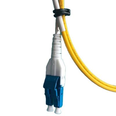 China FTTX LC/UPC-LC/UPC Uniboot Patch Tie SM Duplex Fiber Optic Jumper Yellow for sale