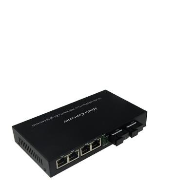 China FTTH FTTB FTTC 1000M Media Converter Gigabit With 2 SFP Ports 4 RJ45 Ports 20km Dual SC Fiber Media Converter With 1*9 Module for sale