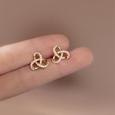 China FASHIONABLE silver 925 18k gold plated Korean summer hollow female clover flower earrings stud earrings for sale