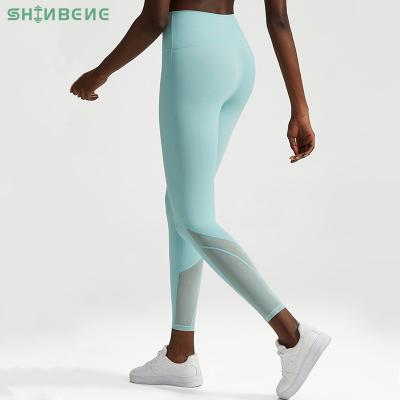 China SHINBENE Logo Butt Lifter Sports Yoga Pants Gym Wear Mesh Fitness Breathable Custom Workout Gaiters For Women for sale