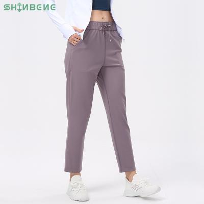 China Sweat-Wicking SHINBENE Drawstring Fitness Sweatpants Comfortable Women's Casual Feel Plain Yoga Sports Training Pocket Joggers XS-XL for sale